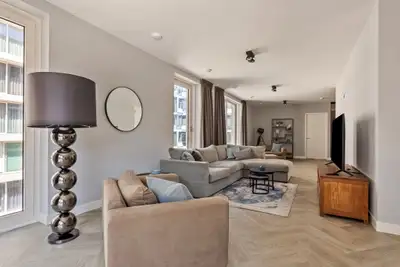 Spacious storage room with washing machine and tumble dryer. Very spacious and bright L-shaped livin...