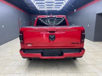 Introducing the 2022 Ram 1500 Sport, draped in a stunning red finish and powered by a robust 4x4 dri... (image 9)