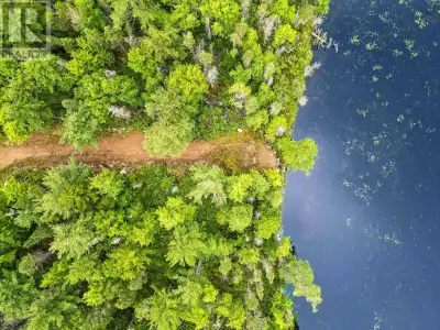 Rare Land Opportunity! Nearly 5 Acres with Lake Frontage in Hubley, NS Discover a unique and rare pi...