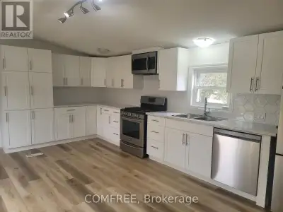 YEAR-ROUND NEWLY RENOVATED 3 BED/2 BATH MOBILE HOME IN HERITAGE ESTATES 55+ PARK ON LARGE CORNER LOT...
