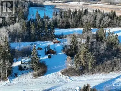 Dynamic farm quarter in the Paxson area of Athabasca County. Fully serviced well treed yard site wit...