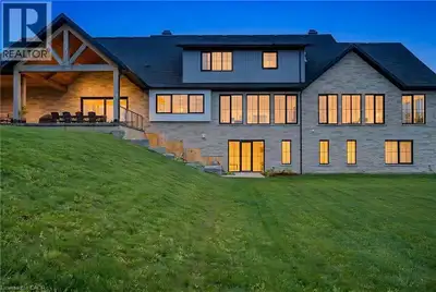 French Chateau–inspired country estate set in WATERLOO, offering nearly 8,400 sq. ft. of finished li...