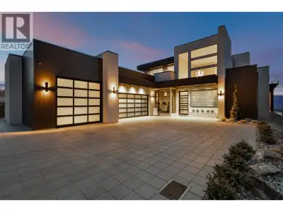 Nestled in Upper Mission, overlooking the Okanagan, this custom-built masterpiece offers panoramic l...