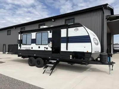 Toy Hauler! Specifications and Features: Exterior Height: 10 ft 6 in Exterior Width: 8 ft Cargo Carr...