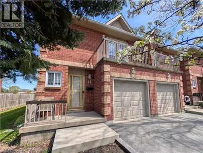 Welcome to this exquisitely maintained, move-in ready executive townhome in the heart of Stoney Cree...