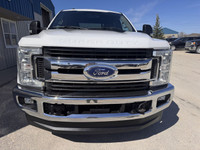 2019 Ford F-350 XLT Crew Cab 4x4 w/ Flatdeck/Bed for sale at Pacific Motors near Winnipeg, ManitobaE... (image 1)