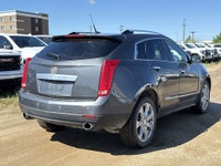 AMVIC Licensed Dealer * All Wheel Drive * Power Sunroof * Bose Speakers * Universal Home Remote * Re... (image 7)