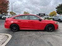 Command attention in this vibrant Rallye Red 2022 Honda Civic Sedan Sport, engineered to make every... (image 3)