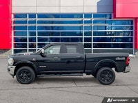 Odometer is 74905 kilometers below market average! Diamond Black Crystal Pearlcoat 2019 Ram 2500 Lar... (image 1)