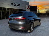 The 2025 Mazda CX-90 MHEV GS-L in a sophisticated gray finish beckons those seeking a premium drivin... (image 4)