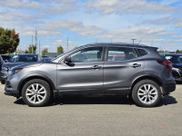 The 2023 Nissan Qashqai SV in a striking color, equipped with an automatic transmission and an all-w... (image 4)