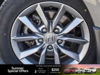 The 2022 Honda Civic Sedan EX, a striking grey 4-door car with a comfortable black interior, redefin... (image 8)