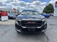 Command the road in this sleek 2018 GMC Terrain SLE, boasting a powerful 1.5L Turbo engine and a wea... (image 1)