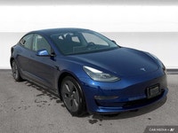 The 2021 Tesla Model 3 offers LED auto-leveling headlights, a panoramic sunroof, and aluminum wheels... (image 6)