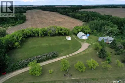 Escape to this mature and scenic 57.66-acre acreage located just north of the Village of Love, offer...