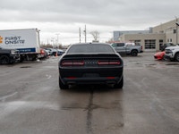 This 2016 Dodge Challenger R/T is powered by a classic 5.7L HEMI V8 engine paired with a smooth auto... (image 6)