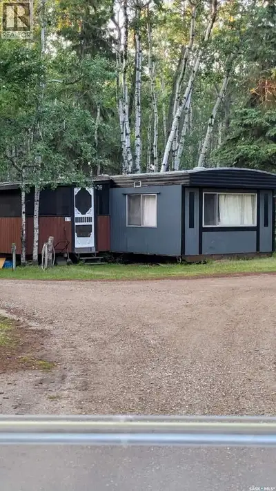 This is your affordable way to break to the lake! A leased lot, this property is situated close to t...