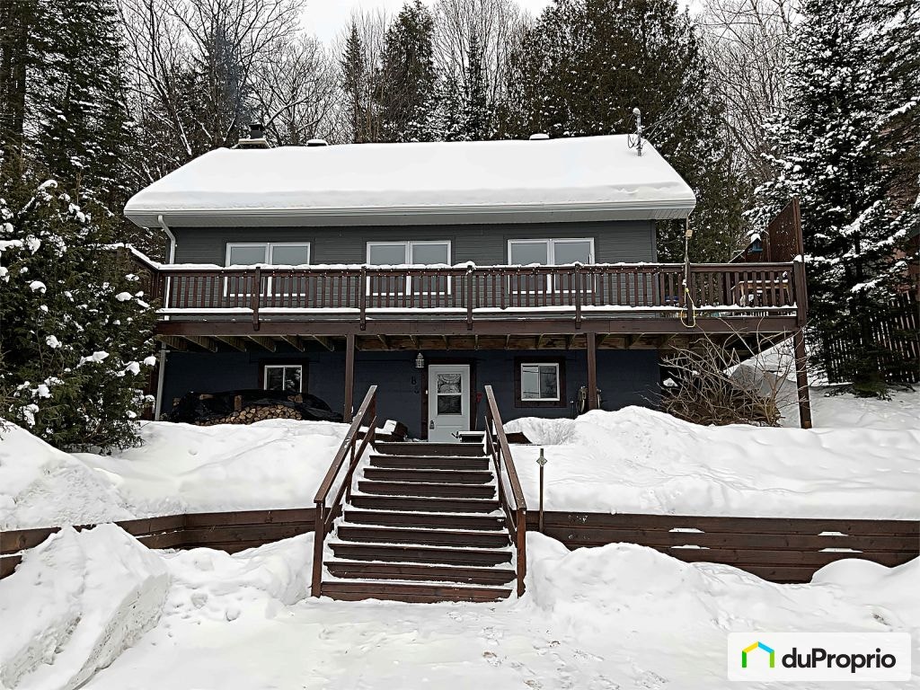 $388,000 - Bungalow for sale in St-Sauveur — photo 1