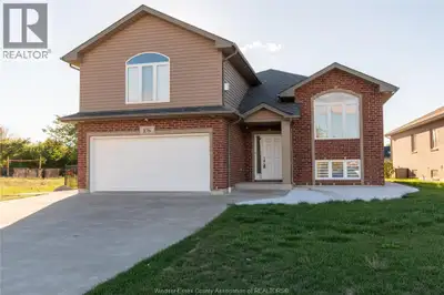 Welcome to exceptional waterfront canal living in Belle River. This custom-built raised ranch with b...