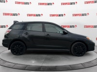 This outstanding example of a 2005 Toyota Matrix XR | 5 SPEED | AIR CONDITIONING | POWER LOCKS | BLU... (image 5)