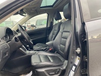 This 2015 Mazda CX-5 GT AWD is a sporty crossover that's smoother than a twisty backroad and comfier... (image 8)