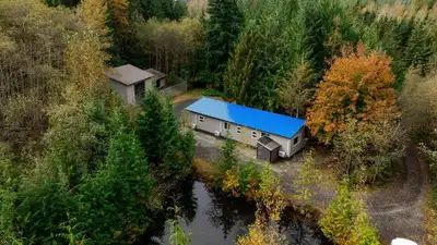 Nestled amidst the scenic beauty of Mission, this 4.6-acre property offers the perfect blend of priv...