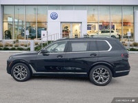This BMW X7 boasts a Intercooled Turbo Gas/Electric I-6 3.0 L/183 engine powering this Automatic tra... (image 1)