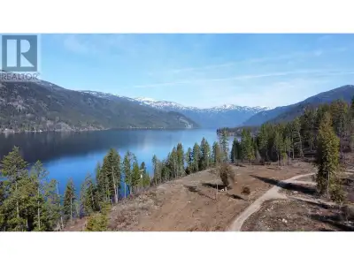 Rare opportunity to own a dynamic 2.9-acre lake view lot in picturesque Christina Lake, BC! Breathta...
