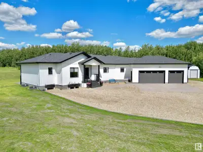 Welcome to the perfect acreage in Camrose County! HAVE HORSES? Then this gorgeous 2000+ sq.ft bungal...