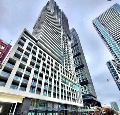 Fabulous Downtown Condo at Dundas Square 39th Floor with Breathtaking City & Lake Views Welcome to t...