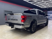 Experience the renowned 2022 Ford F-150 XLT 4x4 SuperCrew in a striking Silver finish, built for bot... (image 8)