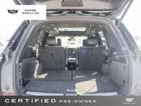 The 2025 Cadillac XT6 AWD Sport, dressed in a sophisticated Stellar Black Metallic exterior and a lu... (image 6)