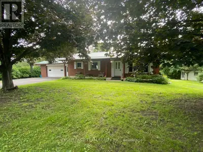 Bungalow with 3 bedrooms, 1 bathroom, dining area/kitchen and living room. Has half basement finishe...