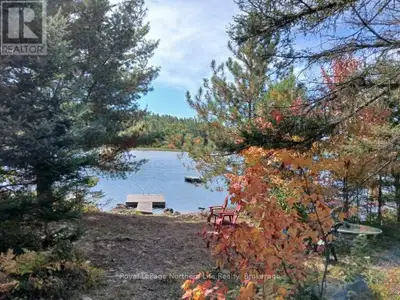 Welcome to your own lakeside retreat on Taggart Lake. 7 acres. Ideal setting to build your dream cot...