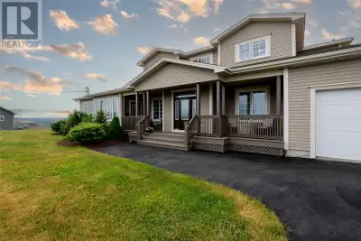 Welcome to your dream home perched above the sparkling waters of Conception Bay! This beautifully cr...