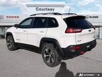 Discover seamless navigation and breathtaking open-air experiences in this Bright White 2017 Jeep Ch... (image 3)