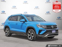 New Price! Odometer is 3459 kilometers below market average! Blue 2023 Volkswagen Taos Highline AWD... (image 6)
