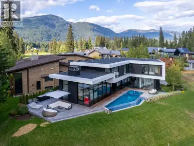 8080 Cypress Place; a breathtaking mid century modern mountain escape that is perfectly positioned o...