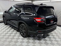 This 2025 Honda Pilot Sport AWD is a lightly used, eight-seat SUV with strong appeal for families an... (image 4)