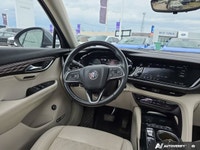 This *2022 Buick Envision Avenir AWD* delivers refined styling, turbocharged performance, and top-ti... (image 9)