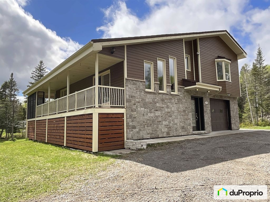 $649,000 - Bungalow for sale in Larouche — photo 1