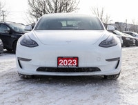 Experience the epitome of modern driving with the 2023 Tesla Model 3 Long Range AWD in a stunning Wh... (image 1)