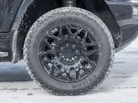 The 2024 GMC HUMMER EV SUV 2X commands attention with an electrified, wide-body stance that blends b... (image 3)