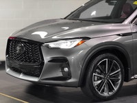 The 2024 INFINITI QX50 SPORT is a new-for-2024 trim level in Canada that brings aggressive, dark-the... (image 3)