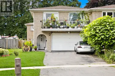 Absolutely stunning 2,858 sqft double garage semi-detached raised bungalow in the highly sought-afte...