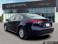 This Toyota Corolla delivers a Gas/Electric I-4 1.8 L/110 engine powering this Variable transmission... (image 2)