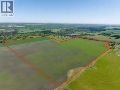 WELCOME to a UNIQUE opportunity (LESS THAN A MILE FROM CALGARY CITY LIMITS!!!) to own 127.28 ACRES o...