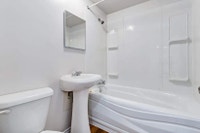 Amenities: Fireplace • Security Lights • Heat & Water Included Suite & Building: Spacious bachelor,... (image 7)