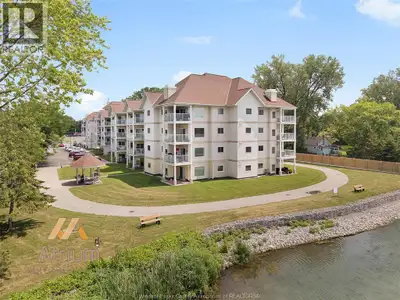 WATERFRONT CONDO, TOP FLOOR! Features an open concept kitchen with updated cupboards and quartz coun...