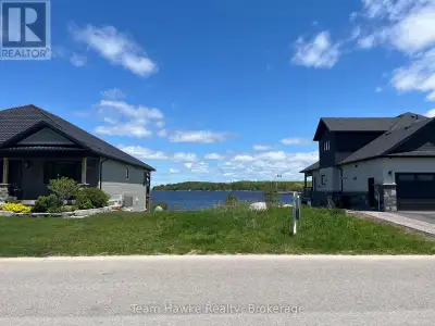 Not often does a true waterfront lot become available in one of Midland's most prestigious communiti...